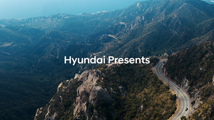 Scene from BTS collaboration video with words 'Hyundai Presents'