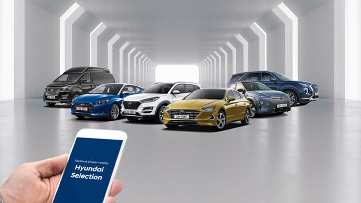 Smartphone with Hyundai Selection screen on and six cars