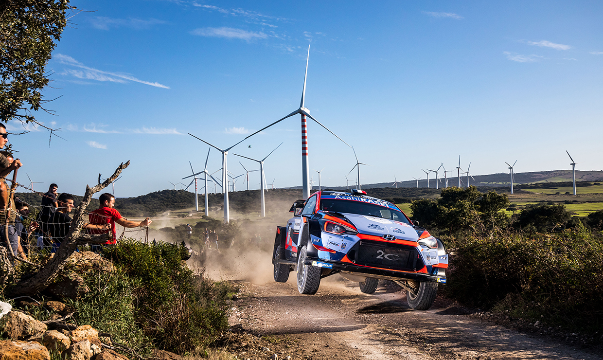 Image of Hyundai Motorsports team racing car driving in WRC course