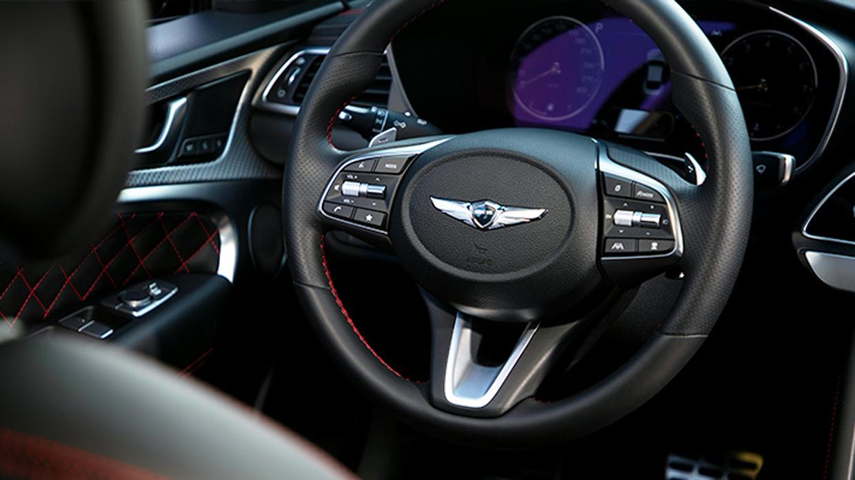 Image of Genesis G70 steering wheel and 3D digital cluster