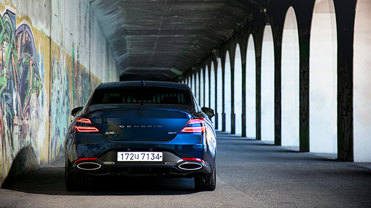 Rear side image of tasman blue Genesis G70