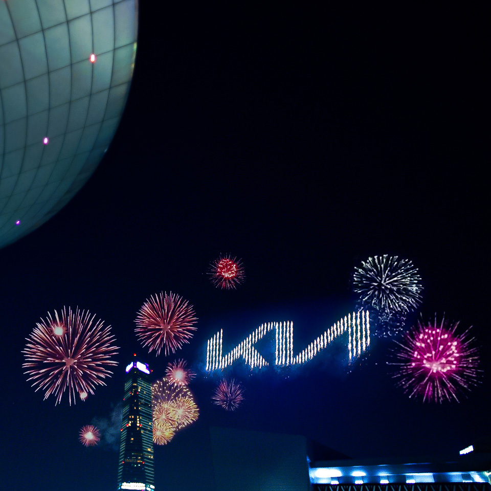 303 pyrodones display Kia new logo with colorful fireworks