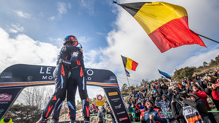 Hyundai motorsports team Thierry Neuville celebrating the first with hugging co-driver