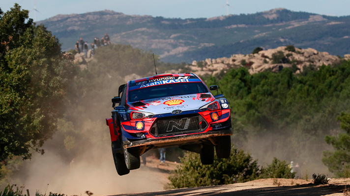 Hyundai Motorsports team racing car jumps on the course