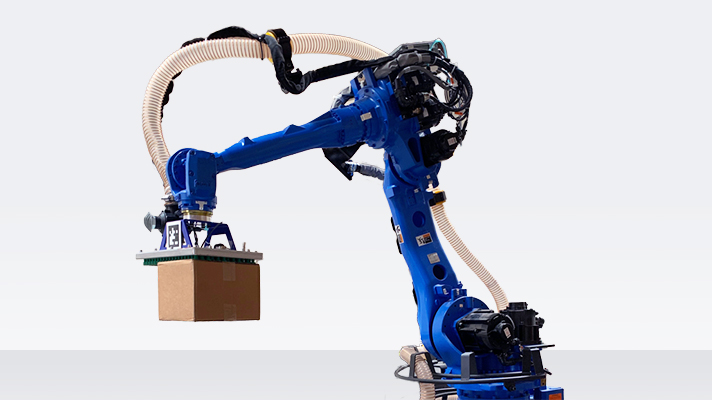 박스를 집어 올리는 픽 로봇