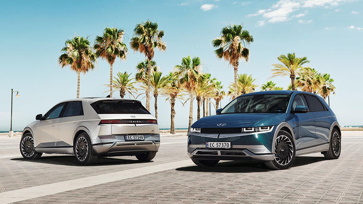 Two Hyundai IONIQ 5 parked on the beach