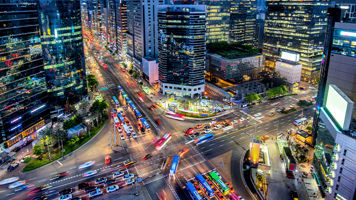 Night view image of a busy city center with heavy traffic