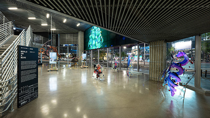 Inside view of Hyundai Motorstudio with World on a Wire sculpture