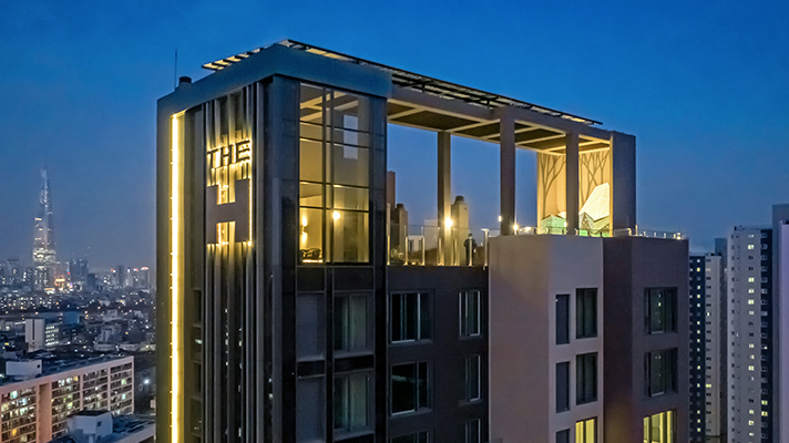 Night view of THE H Forest apartment complex