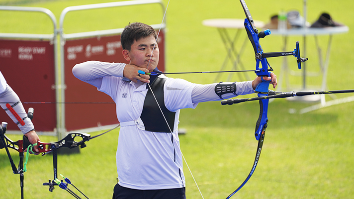 Kim Je-deok pulling bowstring archery player Korean National Archery Team