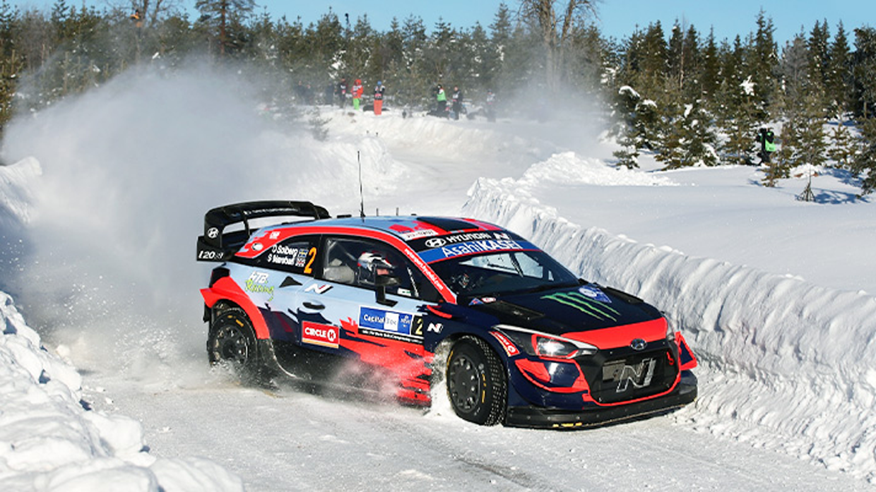 View of Hyundai motorsports team racing car i20 driving fast