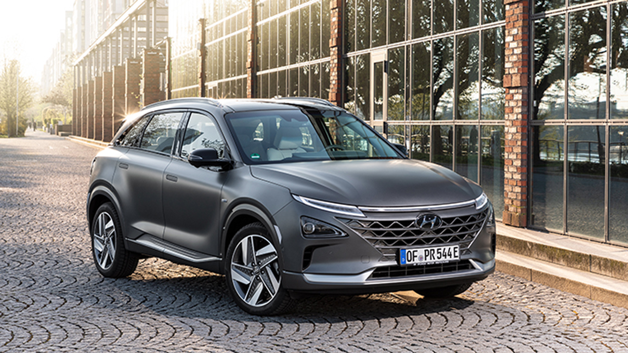 Front view of Hyundai NEXO parked in front of the building