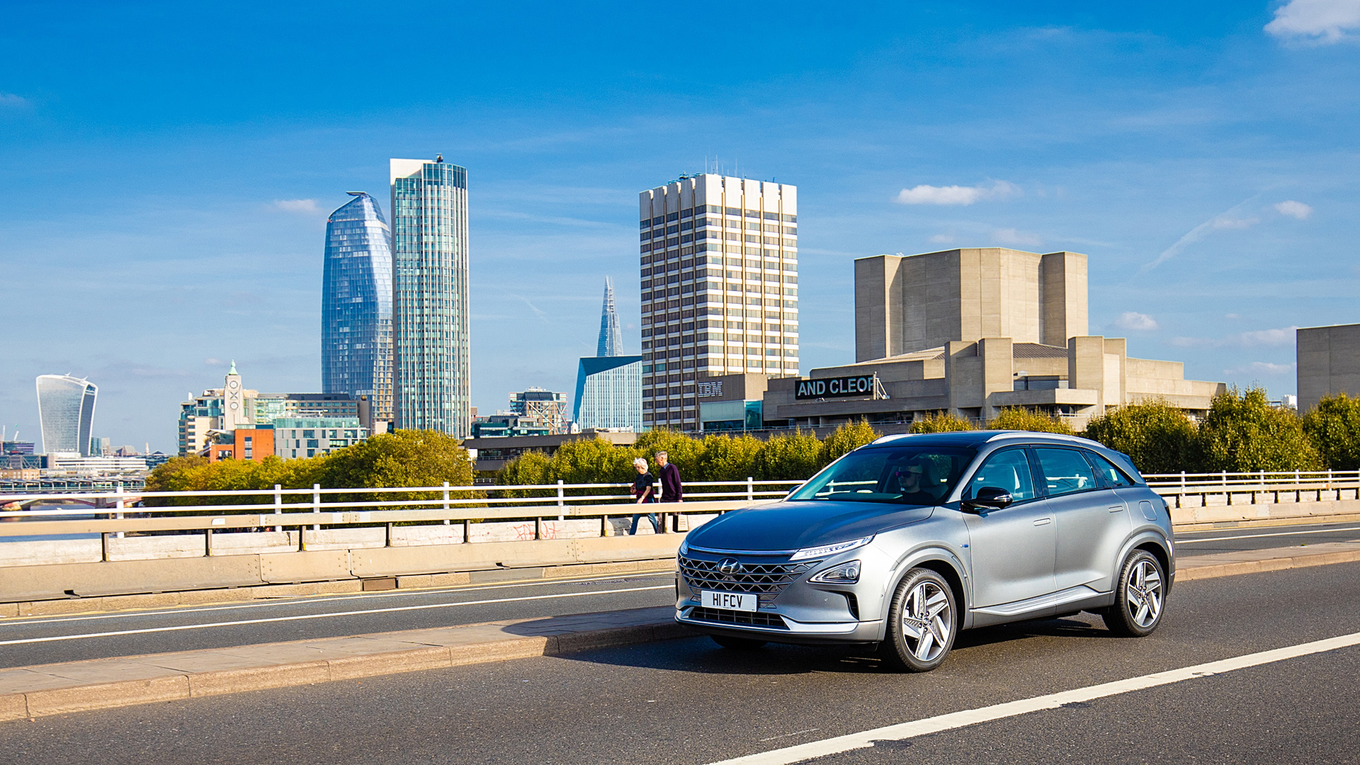 Front view of Hyundai car running on the bridge