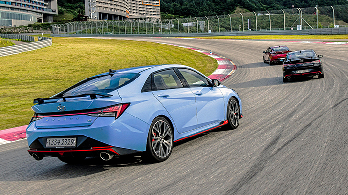 Rear view of Hyundai Avante N running around the circuit