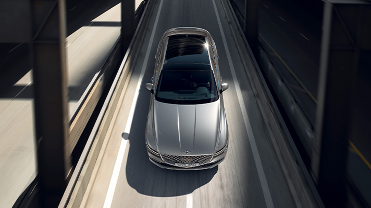 Top view of Genesis G80 running on the bridge