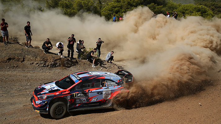 Rally car i20 WRC running on sand