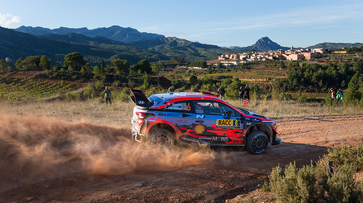 WRC side running on dirt road