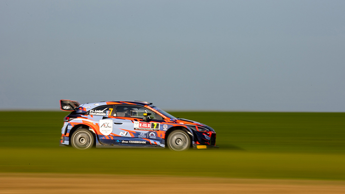 Side of a fast-paced rally car