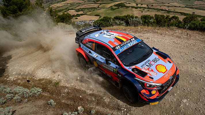 Front side of i20 WRC running on dirt road