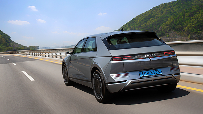 Rear view of Hyundai IONIQ 5 driving on the highway