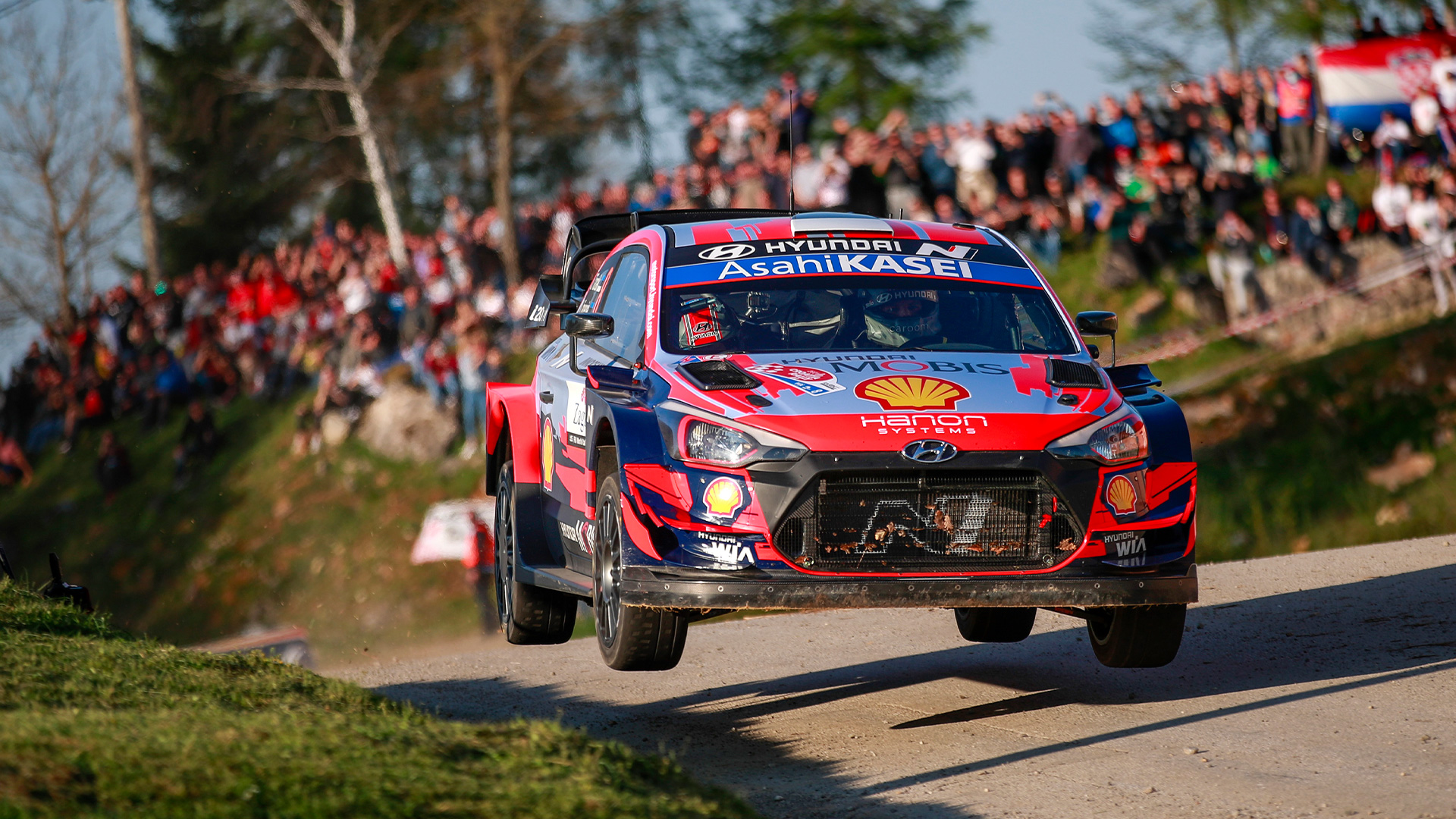 Hyundai i20 Coupe WRC running on unpaved roads