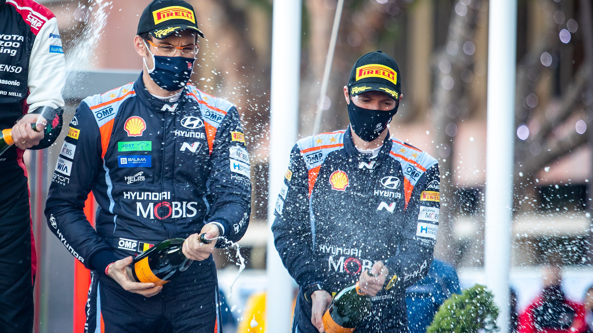 Hyundai motorsports team Thierry Neuville celebrating the second with co-driver at podium