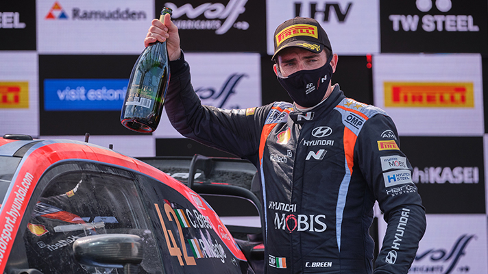 Craig Breen holding champagne