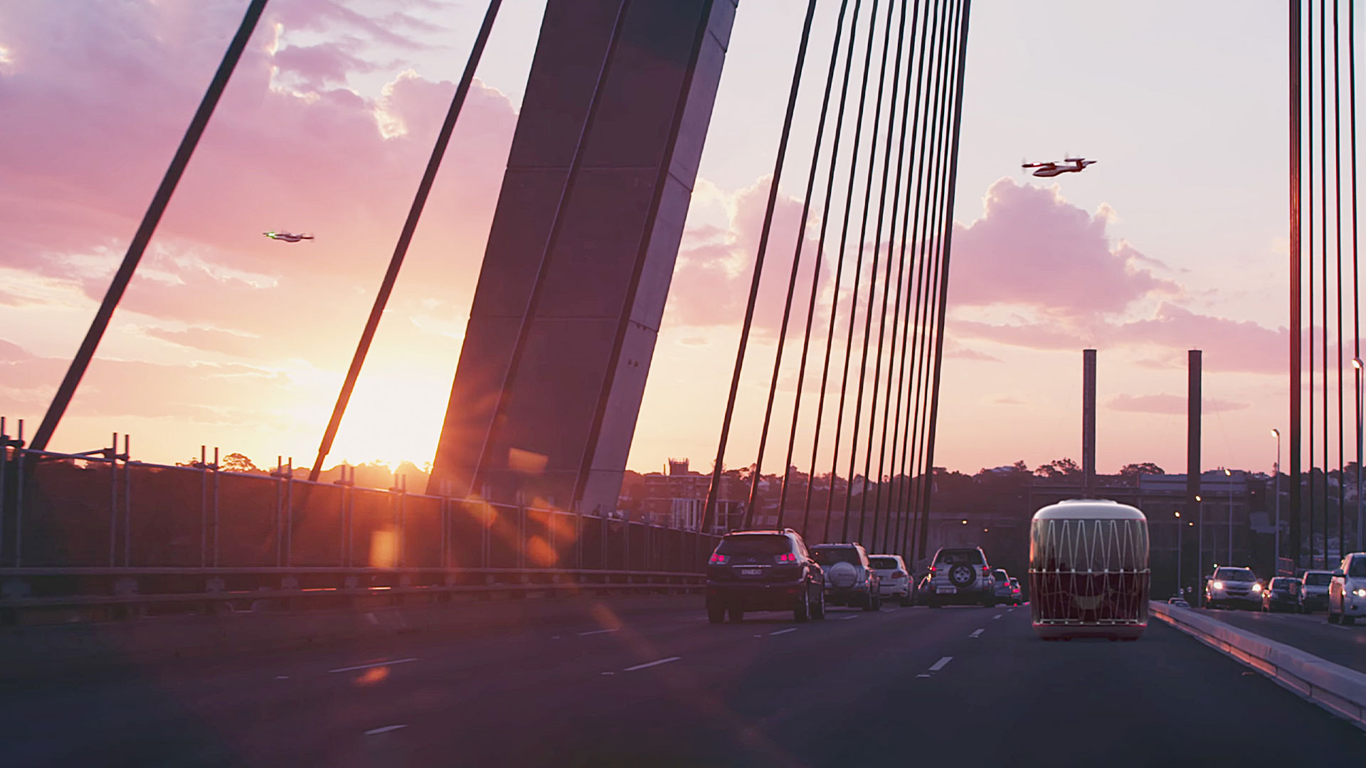 노을지는 다리는 건너는 차량과 PBV 그리고 하늘을 나는 UAM 모습