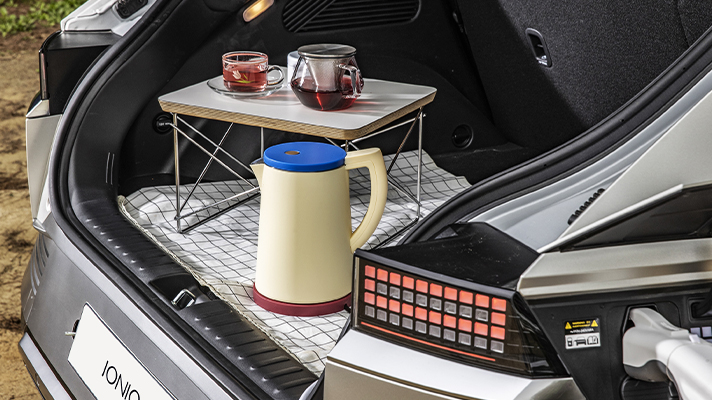 Tea table and pot placed in the trunk of Hyundai IONIQ 5