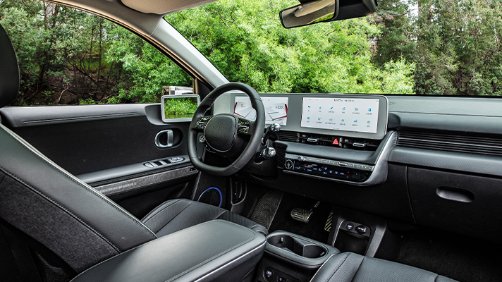 Hyundai IONIQ 5 interior image with driver seat in focus