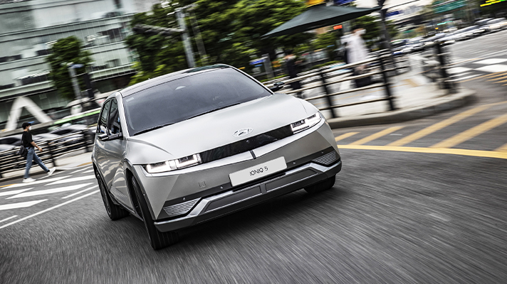 Image of Hyundai IONIQ 5 passing the crosswalk