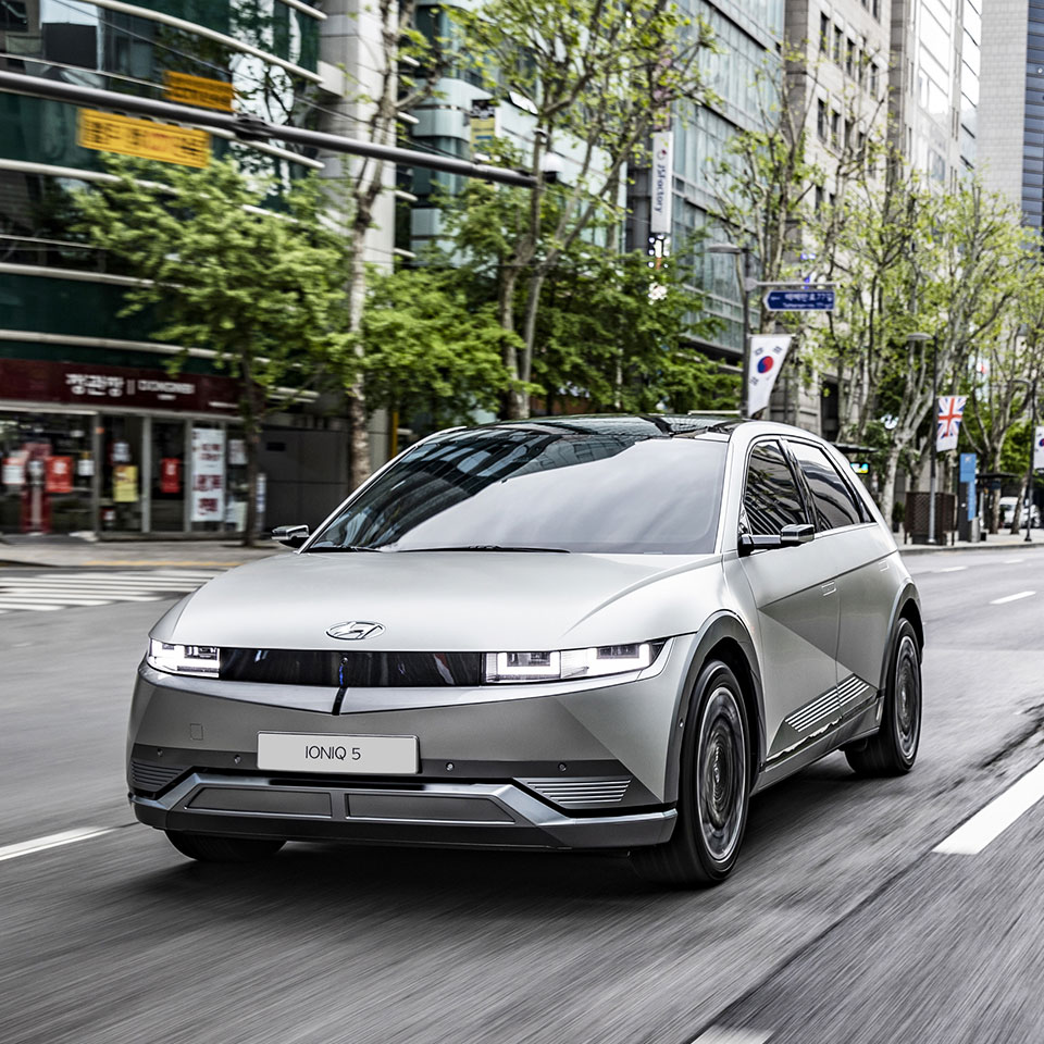 Front view of Hyundai IONIQ 5 running in a busy city