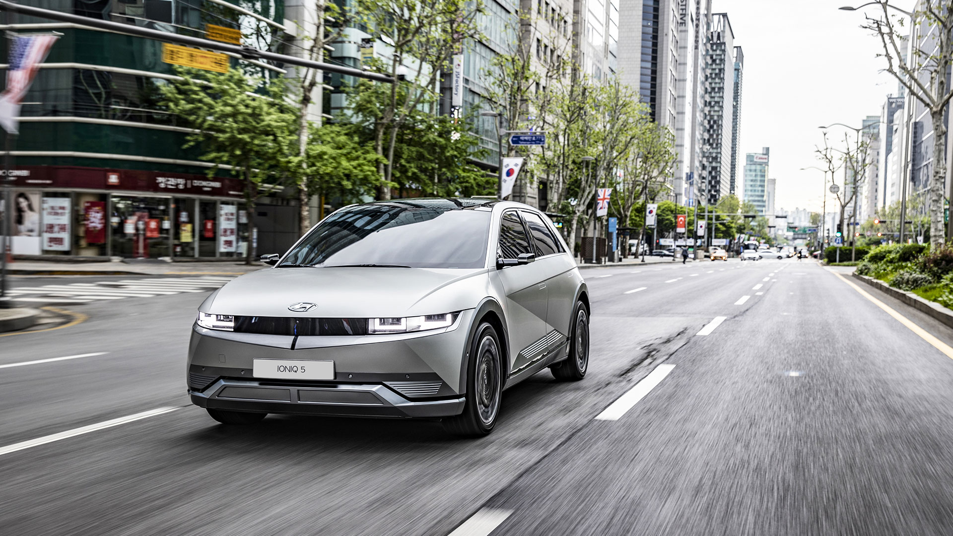 Front view of Hyundai IONIQ 5 running in a busy city