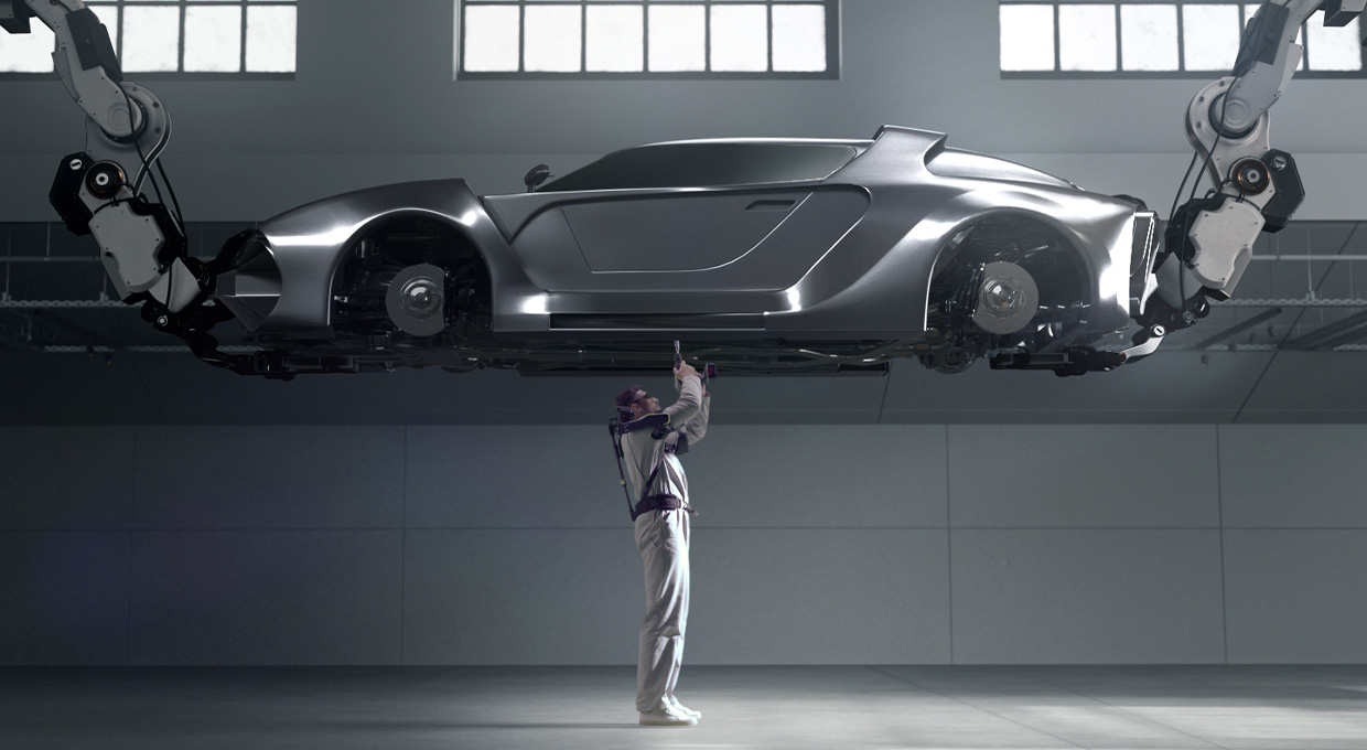 상반신 보조웨어러블 로봇을 착용하고 차량 정비를 하는 사람의 모습