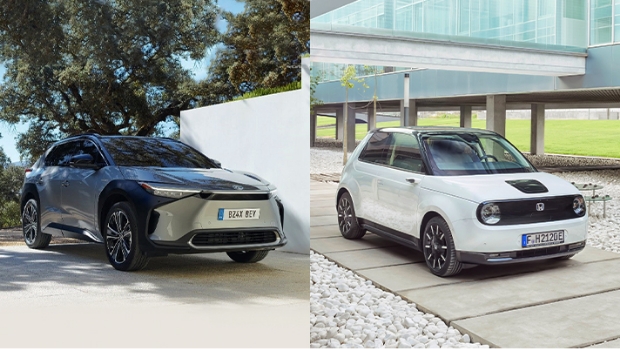 Toyota's electric SUV bZ4X photo on the left and Honda's small electric hatchback on the right