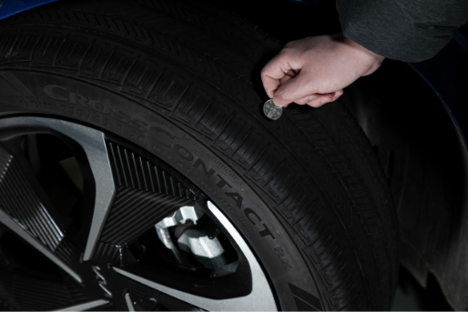 Checking the tire tread through a 100 won coin