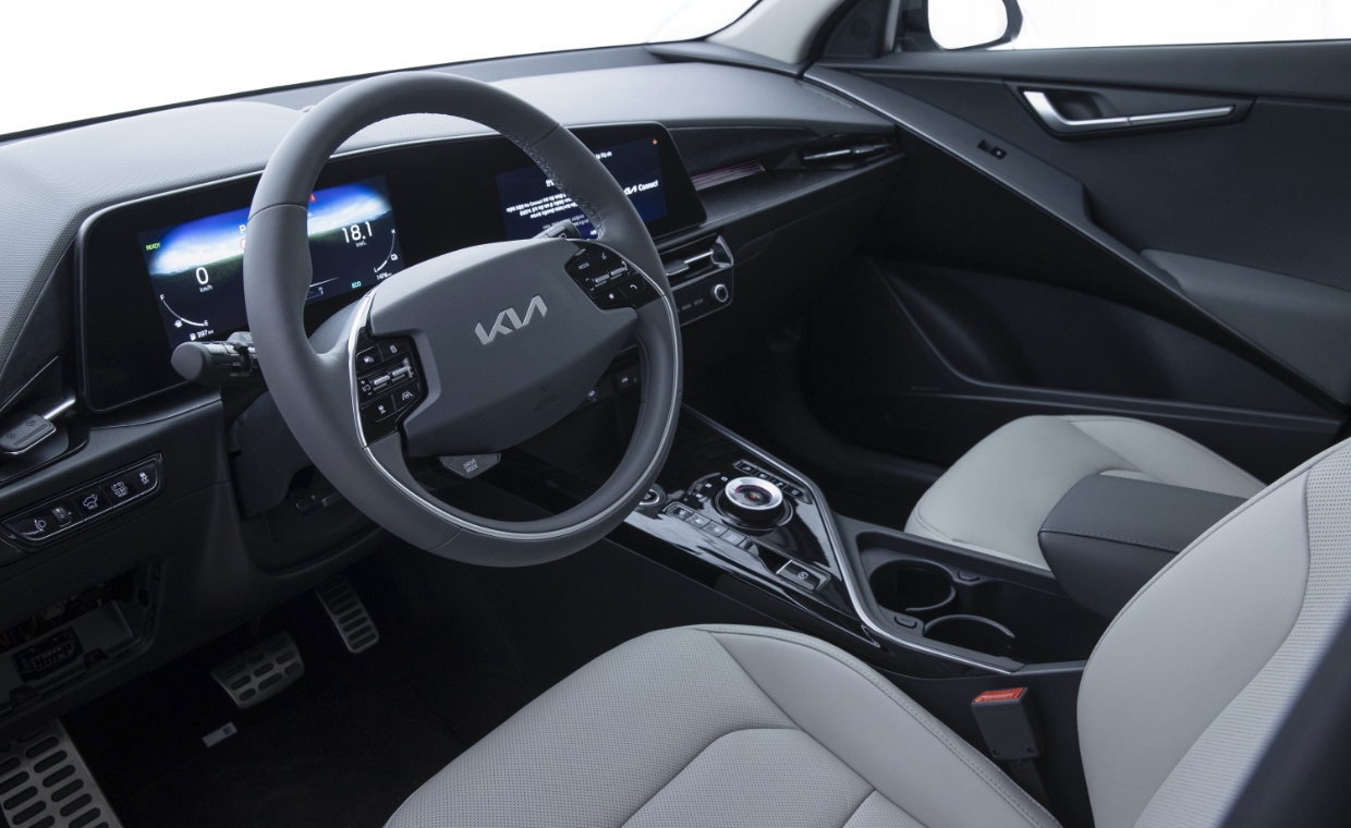 Niro's steering wheel and instrument panel and seat and center console from the driver's window