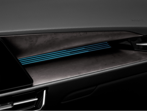 Niro's crash pad on the passenger seat with the chop carbon pad print and blue ambient light on