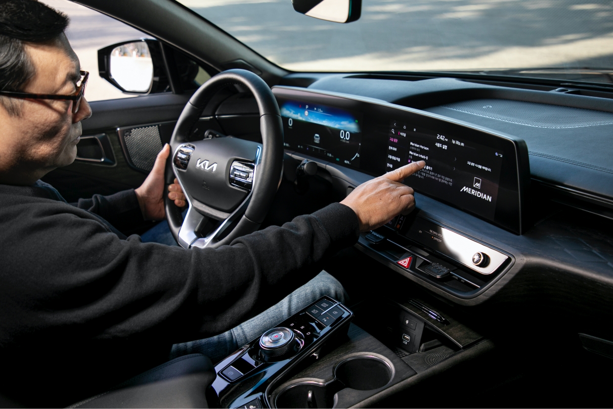 Audio expert setting up audio sound through infotainment