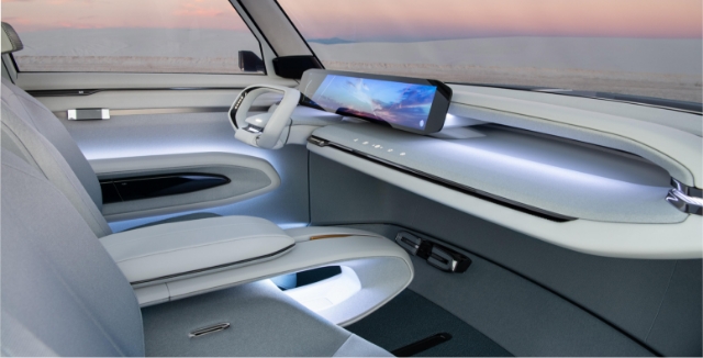The interior of The Kia EV Concept EV9, which uses eco-friendly materials to create a premium lounge-like atmosphere