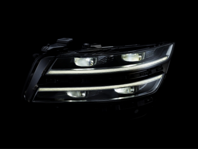 Picture of Genesis G80 disassembled headlamp module and the light turned on