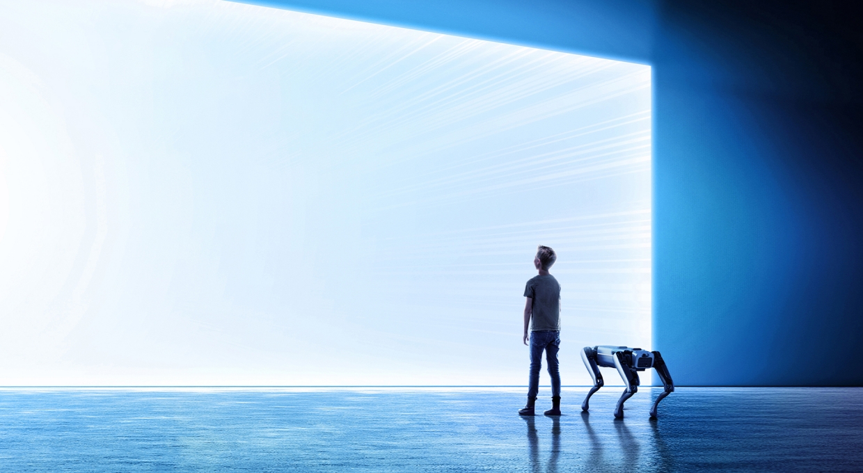 새하얀 화면을 바라보는 아이와 4족 보행 로봇 ’스팟’의 모습