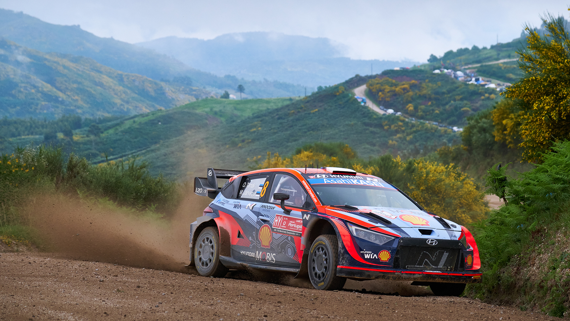 i20 rally car speeding up in the mountains