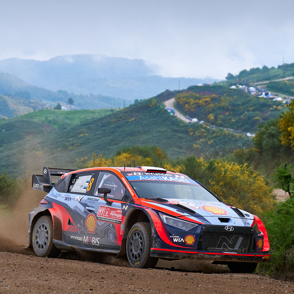 i20 rally car speeding up in the mountains