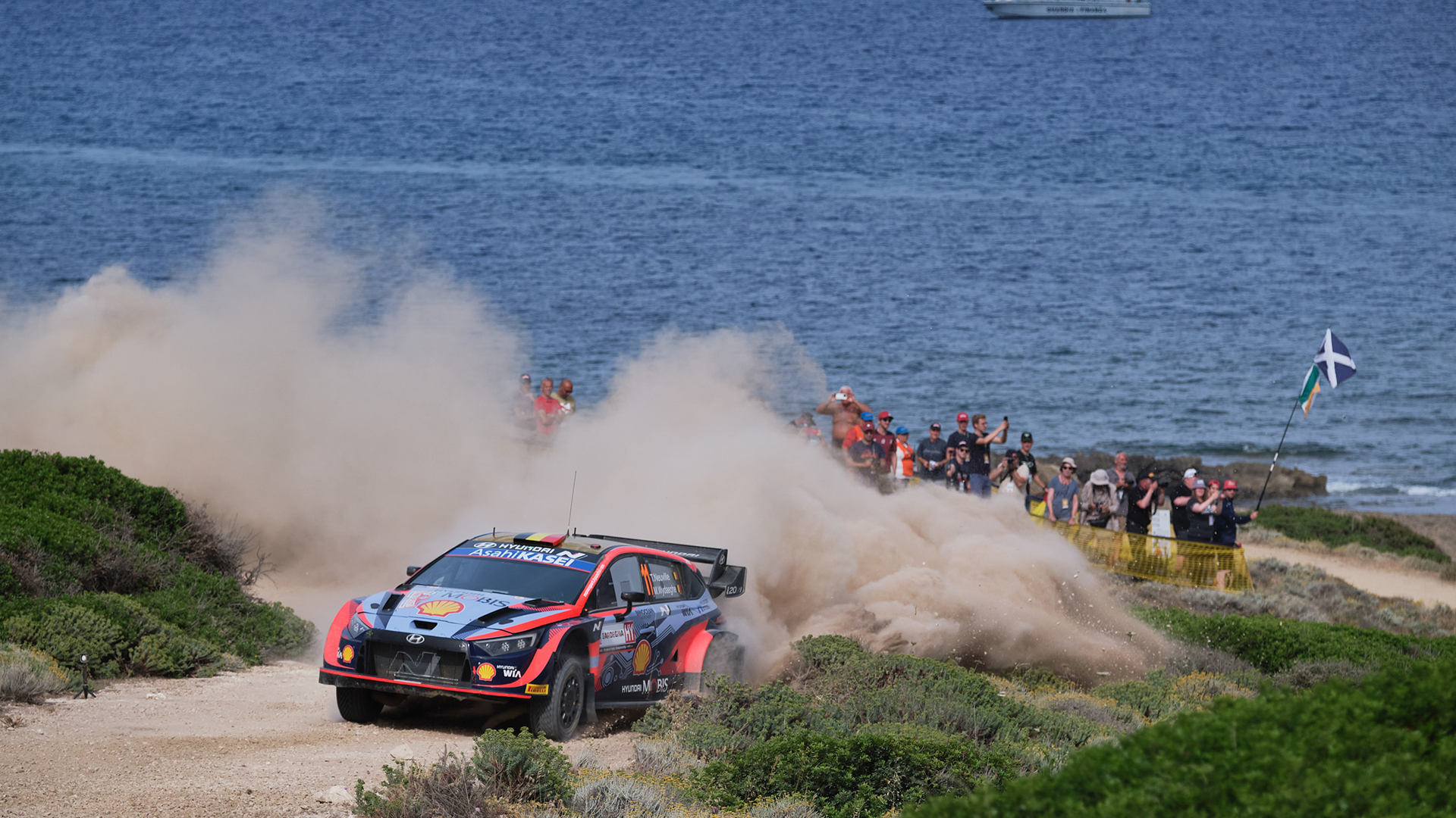 Hyundai i20 N WRC Rally 1 driving in the Mediterranean view