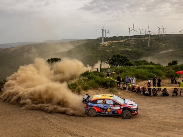 Hyundai i20 N WRC Rally 1 on a slippery dirt road