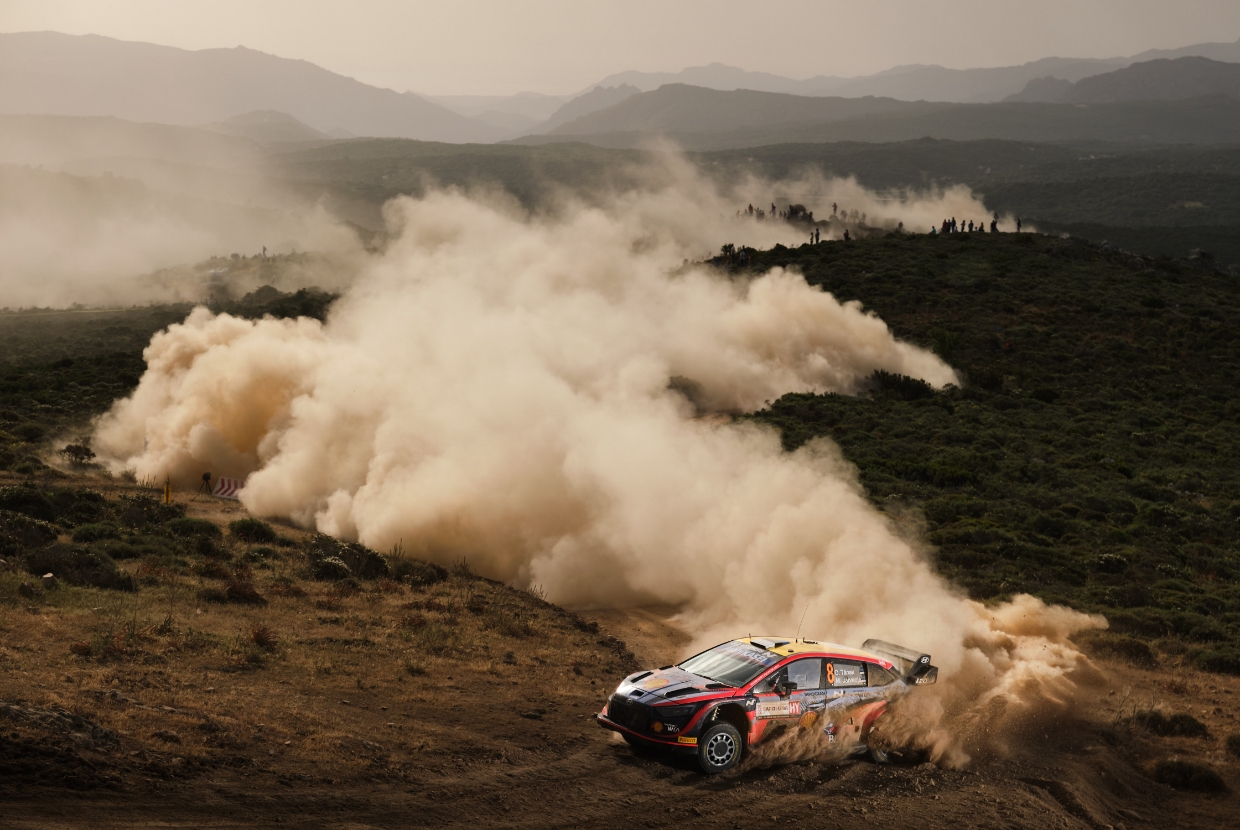 Hyundai i20 N WRC Rally 1 driving with dust trail