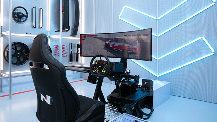 N Lounge interior view, racing simulator installed