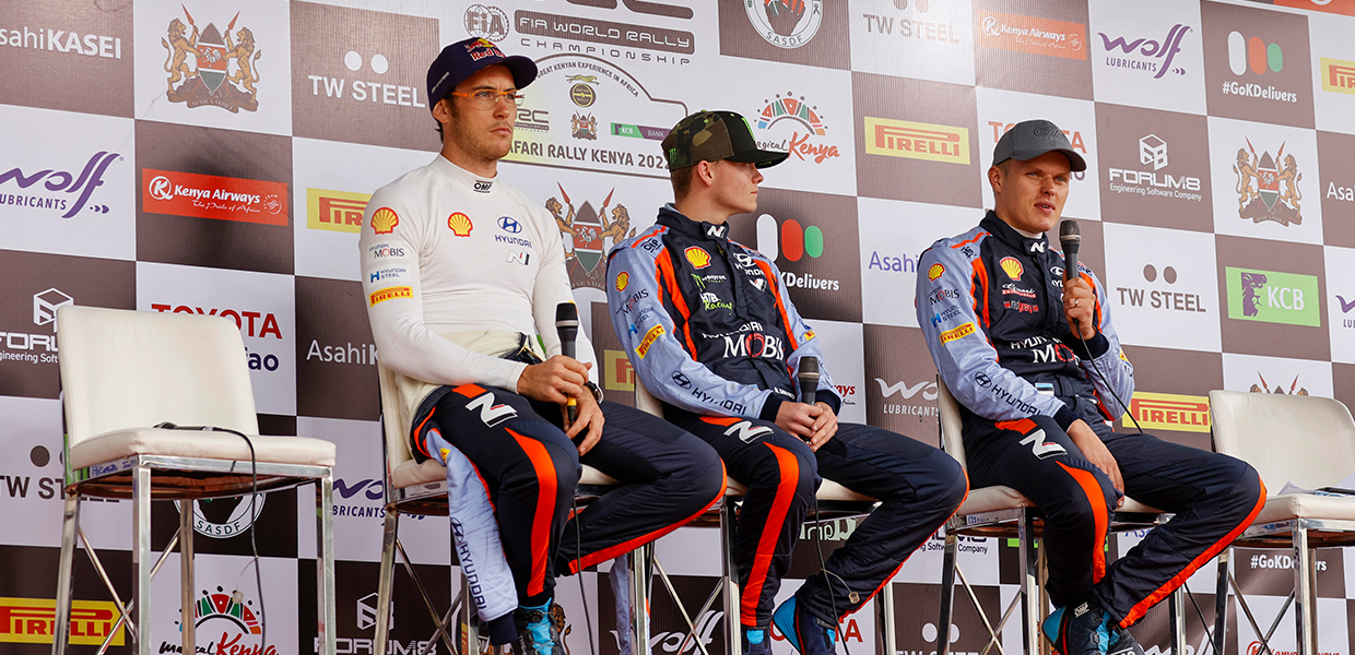 Thierry Neuville, Oliver Solberg, and Ott Tanak of Hyundai Motorsport sitting side by side