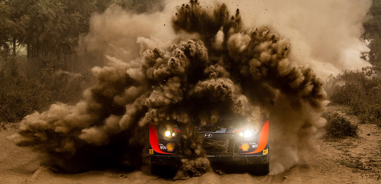 Hyundai i20 N WRC Rally 1 runs through the sand